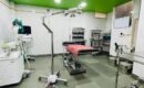 A clean and well-lit top rated healthcare facility in Jaunpur operating room with a surgical table, medical equipment, and surgical lights.