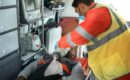 An EMT providing emergency medical care to a patient on a stretcher inside an ambulance. this is the importance of 24/7 emergency services.